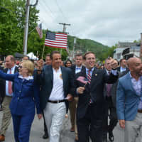 <p>Hillary Clinton, third from left, marches in downtown Chappaqua for the 2016 Memorial Day parade. Also pictured: Town Board members Lisa Katz and Adam Brodsky, Gov. Andrew Cuomo, Assemblyman David Buchwald and Councilman Jeremy Saland.</p>