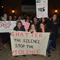 <p>Students gather outside at WestConn&#x27;s Midtown campus in Danbury. They walked around the quad chanting and waving signs to raise awareness to stop domestic and sexual abuse violence.</p>