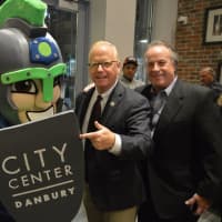 <p>Danbury Mayor Mark Boughton, Danbury Titans owner Bruce Bennett and the team mascot pose for a picture.</p>