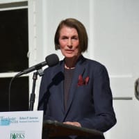 <p>Dee DelBello, wife of the late Westchester County Executive Al DelBello, speaks at the dedication ceremony at Muscoot Farm in Somers. The farm was renamed in her husband&#x27;s honor.</p>