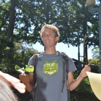 <p>Ethnobotanist Hayden Stebbins explains how to prepare garlic mustard, a weed found in many backyards, at the Westport Public Library.</p>