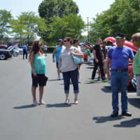 <p>Crowds check out the Shelton car show on Sunday.</p>