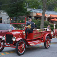 <p>An antique Thornwood firetruck is driven in the Mount Kisco Fire Department&#x27;s parade.</p>