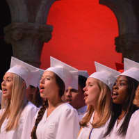 <p>Members of Fox Lane High School&#x27;s Concert Band sing during the National Anthem at the 2016 commencement.</p>