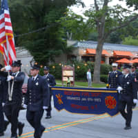 <p>Bedford firefighters march in the Mount Kisco Fire Department&#x27;s parade.</p>