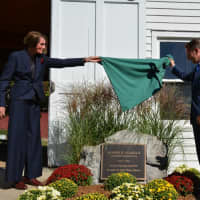 <p>An honorary plaque for Al DelBello is unveiled at Muscoot Farm in Somers.</p>