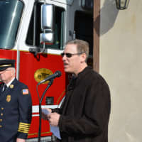 <p>Millwood Fire Commissioner Alan Schapiro speaks at the decommissioning ceremony for Station No. 1.</p>