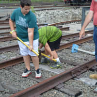 <p>Kids test out the equipment on the train tracks at the Danbury Railway Museum.</p>
