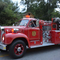 <p>An antique Bedford firetruck is driven in the Mount Kisco Fire Department&#x27;s parade.</p>