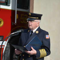 <p>Neil Gollogly, who has been a Millwood volunteer firefighter since the 1950s, delivers a de facto eulogy for Station No. 1, which is being retired after more than 90 years of usage.</p>