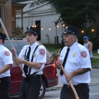 <p>Valhalla firefighters march in the Mount Kisco Fire Department&#x27;s parade.</p>