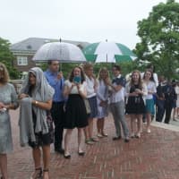 <p>Family and friends of the graduates wait for their final walk.</p>