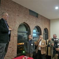 <p>Daily Voice Founder and CEO Carll Tucker addresses the crowd.</p>