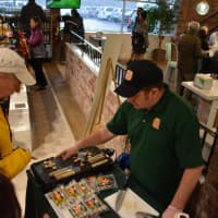 <p>Free samples of sausage are offered at DeCicco &amp; Sons in Millwood.</p>