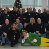<p>Bergen County PBA members and HUMC officials gather for a picture before distributing gifts.</p>
