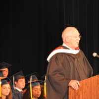 <p>Pine Plains school board President Fred &quot;Chip&quot; Crouse addresses Stissing Mountain High School&#x27;s 2016 commencement.</p>