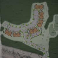 <p>A photo of a layout drawing that depicts a 49-townhouse proposal for a site in Goldens Bridge.</p>