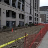 <p>Snow fences are set up as part of the construction project on Lafayette Hall at Housatonic Community College in Bridgeport.</p>