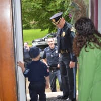 <p>Police Chief John Russo picks up &quot;Chief For a Day&quot; Jack Boylan at his house.</p>