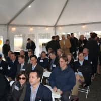 <p>A packed crowd gathers under a tent to hear remarks prior to a groundbreaking at Chappaqua Crossing.</p>