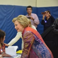 <p>Hillary Clinton checks in to her polling place at Chappaqua&#x27;s Douglas G. Grafflin Elementary school in order to vote in New York&#x27;s Democratic presidential primary.</p>