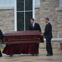 <p>Pallbearers move Frances Ghelarducci casket to a hearse following her funeral at St. Joseph&#x27;s Church in Somers.</p>