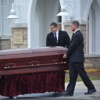 <p>Pallbearers move Frances Ghelarducci&#x27;s casket to a hearse following her funeral at St. Joseph&#x27;s Church in Somers.</p>