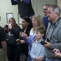 <p>Family and friends watch the signings Friday at the Wilton Y.</p>