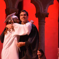 <p>Bedford Central school board member Andrew Bracco gets a hug from his daughter, Alicia, who is among Fox Lane High School&#x27;s 2016 graduates.</p>