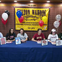 <p>Six swimmers from the Wilton Y Wahoos swim team met at the Wilton Y Friday to sign National Letters of Intent at a brief ceremony.</p>