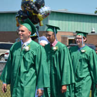 <p>Members of Webutuck High School&#x27;s Class of 2016 march to their commencement.</p>
