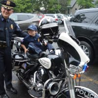 <p>Jack tries out a police motorcycle.</p>