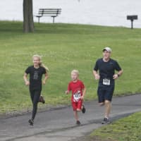 <p>Runners run along the scenic Hudson late in Sunday&#x27;s 5K course.</p>