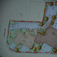 <p>A site plan that shows the proposed Chappaqua firehouse expansion. The darker portion of the structure represents the expansion while the lighter portion represents the existing part.</p>