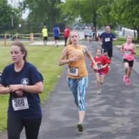 <p>Runners head for the finish at Sunday&#x27;s 5K.</p>
