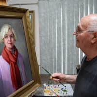 <p>Sal Caldarone with a portrait he painted of his wife, Clara.</p>