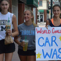 <p>Ramsey&#x27;s Olivia Manzo, Rebecca Schachtel, and Sarah Welsh take a Starbucks break while helping advertise a car wash at the high school.</p>