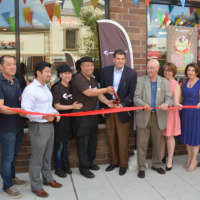 <p>The ribbon-cutting ceremony at T-Swirl Crepes featured a lion dance.</p>