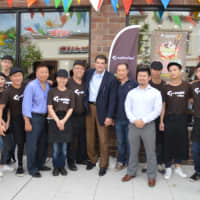 <p>Davig Weng and Fort Lee Mayor Mark Sokolich with members of the T-Swirl Crepes team.</p>