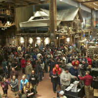 <p>People pour into the new Bass Pro Shop at Wednesday&#x27;s Grand Opening.</p>