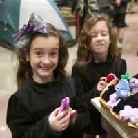 <p>Two sisters check out the toys at Bass Pro.</p>