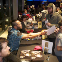 <p>Pro athletes, including World Series Champ Johnny Damon (second from left) sign autographs at the Bass Pro Grand Opening.</p>