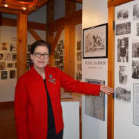 <p>Executive Director Susan Gunn Bromley explains the Weston Historical Society&#x27;s latest exhibit, &quot;Memories of World War II.&quot;</p>