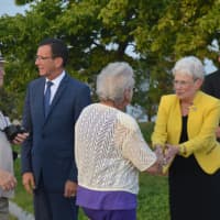 <p>Gov. Dannel Malloy, second from left, and Lt. Gov. Nancy Wyman greet those gathered for the state&#x27;s official 9/11 memorial in Westport Thursday.</p>