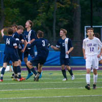 <p>Panas players celebrate overtime goal that wins Wednesday&#x27;s game at John Jay.</p>