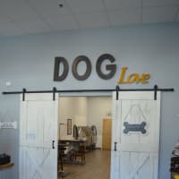 <p>Barn doors add a homey feel to Wet Paws Dog Grooming of Trumbull.</p>