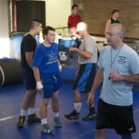 <p>Coach Dennis DiSanto oversees a recent practice at Mahopac High School.</p>