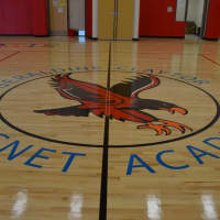 <p>The Fighting Hawk logo adorns the floor of the new gym at Geraldine Claytor Magnet Academy in Bridgeport.</p>
