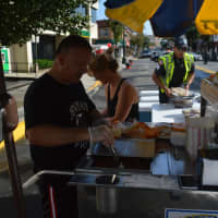 <p>Jenna&#x27;s Franks hot dog vendor Rodney Telleri cooks in Cliffside Park.</p>