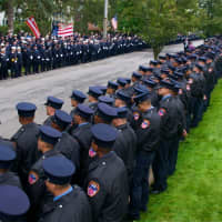 <p>Thousands of firemen, NYPD, public officials and civilian attendees lined the streets around the Church of the Annunciation to mourn FDNY Battalion Chief Michael Fahy.</p>
